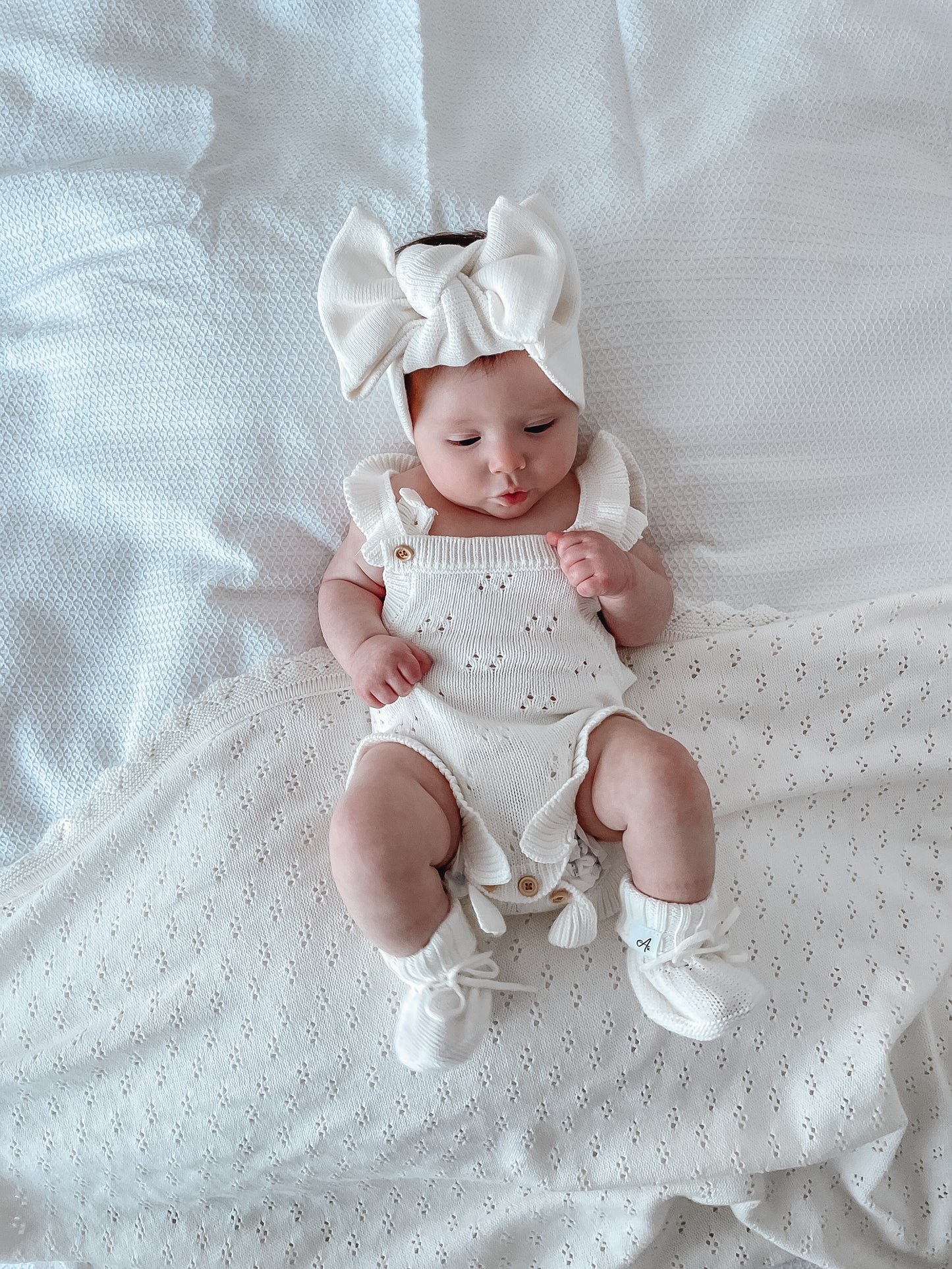 Dahlia Sleeveless Pointelle Romper – Milk